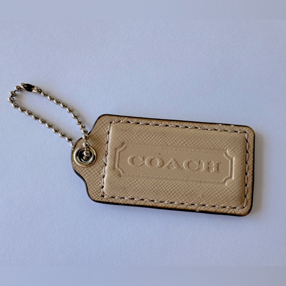 Coach Accessories - Coach Beige Leather Replacement Hang Tag